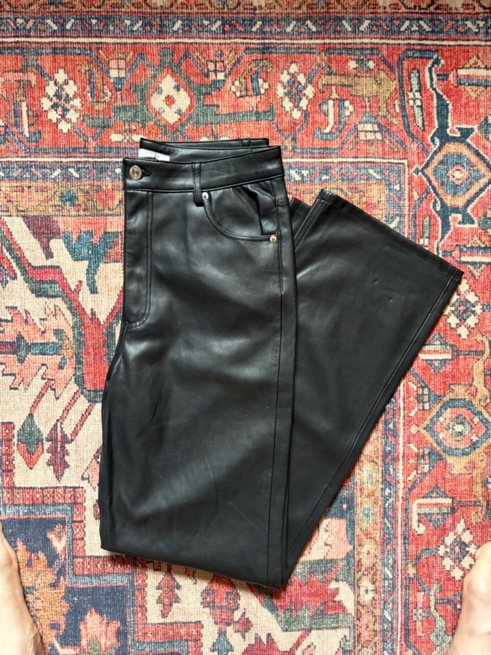Black faux leather straight leg pants